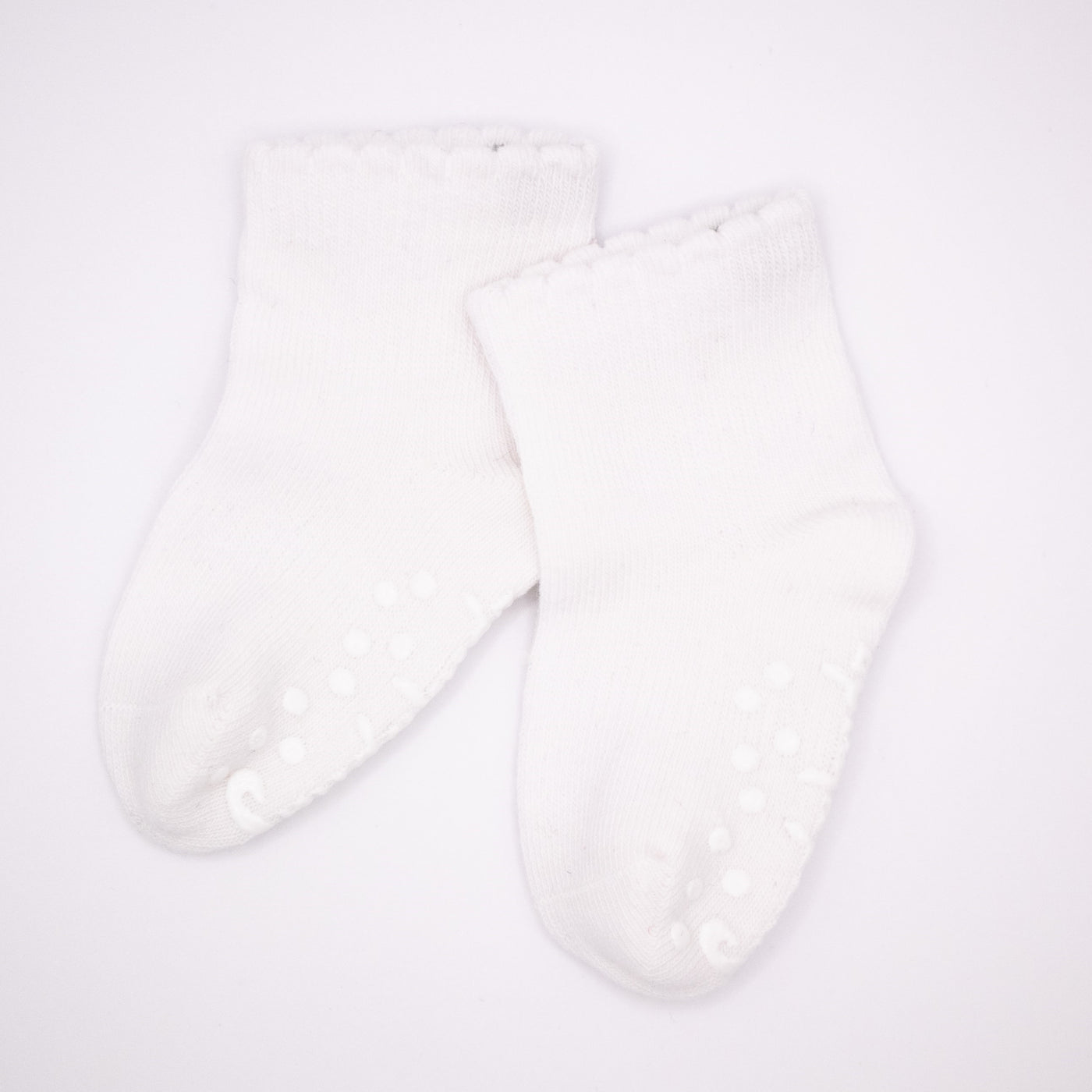 Snugabugz white organic cotton Baby Socks That Stay On Baby's Feet  gender neutral infant socks with non-slip soles Pack of 3 pairs. Baby socks that don't fall off. Baby socks with grips.