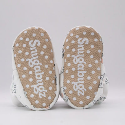 Gender Neutral white baby booties that stay on for infants made with soft organic cotton, sustainable, with flexible non-slip soles. Barefoot soft sole baby shoes. unique baby shower gift idea or new baby gift idea. Cute Unisex Elephant Print