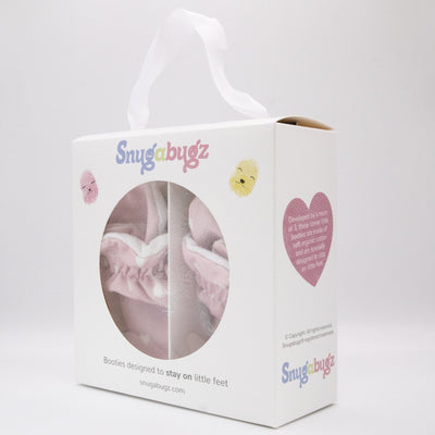 Snugabugz pretty pink baby girl booties that stay on for infants made with soft organic cotton, sustainable, with flexible non-slip soles. Barefoot soft sole baby shoes in gift box for baby shower gift or new baby girl gift idea. Pram slippers
