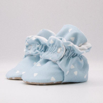 Infant Baby Booties that stay on in blue organic cotton with non-slip soles and adjustable snap closure